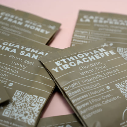 Image showing sachets from the coffee advent laid out on a table
